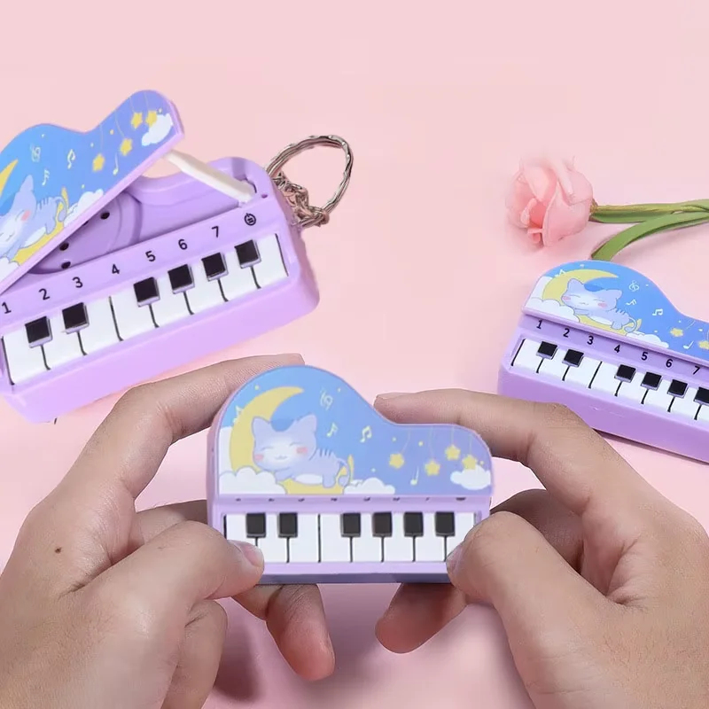 Cute Mini Desktop Piano Keycha - Kids Education Music ulasan dan harga